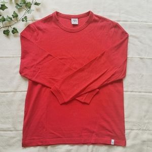 ZARA red long-sleeve top.